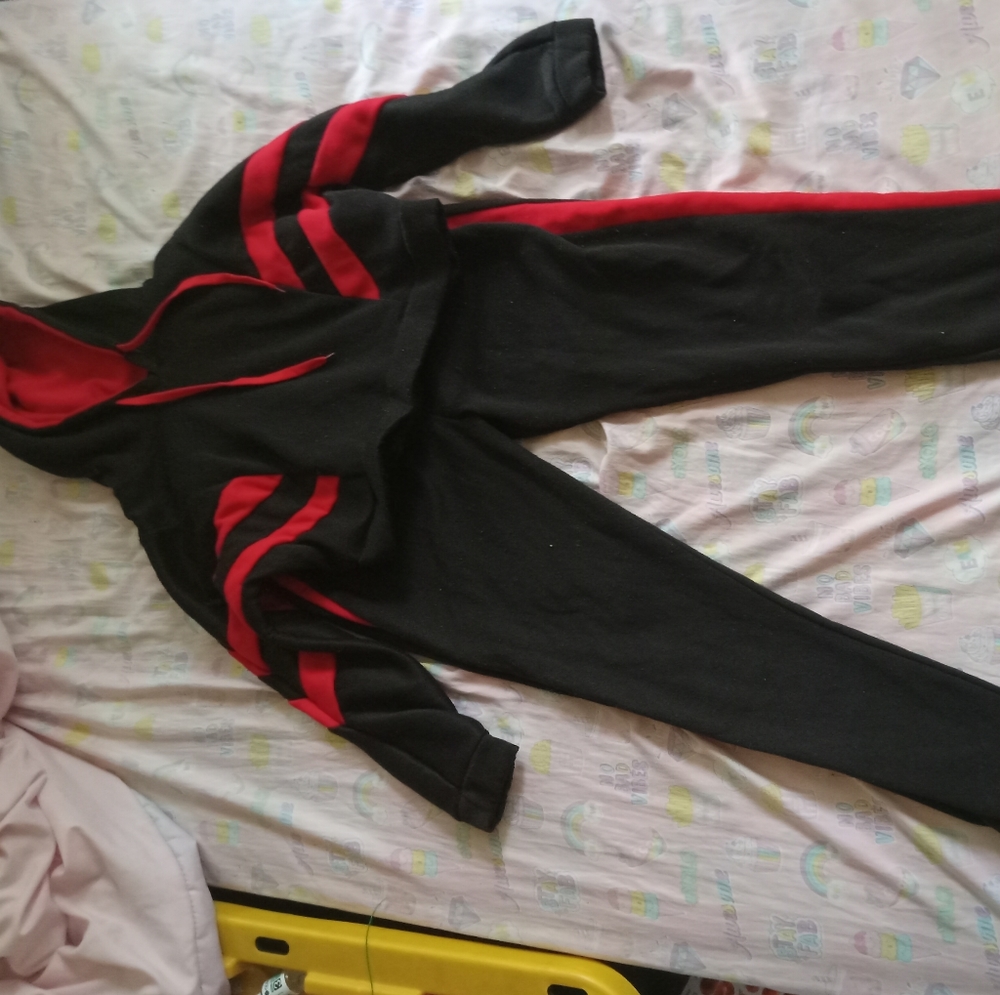 Red and black track suit